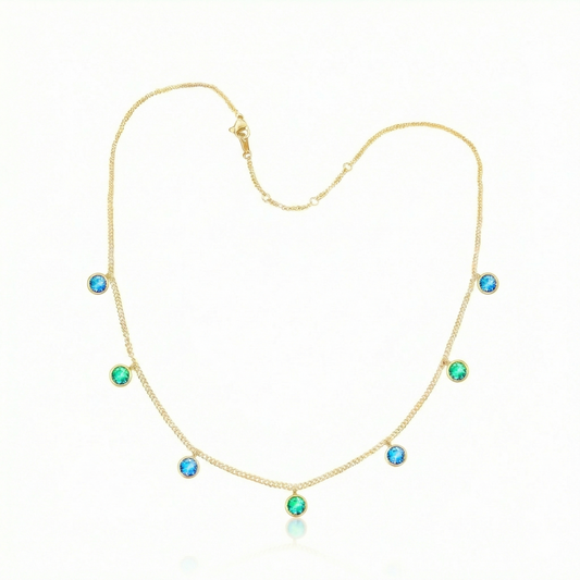 Multi Stone Necklace featuring radiant 5mm blue/green stones arranged in a harmonious multi-stone composition. The adjustable 16-18" gold chain provides flexibility to suit your preferred drape and neckline. Crafted for those who appreciate quality materials and thoughtful design. 
