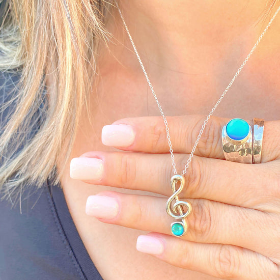 Musical Note Pendant and matching Musical Note Earrings. Each piece is crafted with high-quality sterling silver components, ensuring durability and style. Includes an 18" sterling silver 1mm cable chain with the pendant.