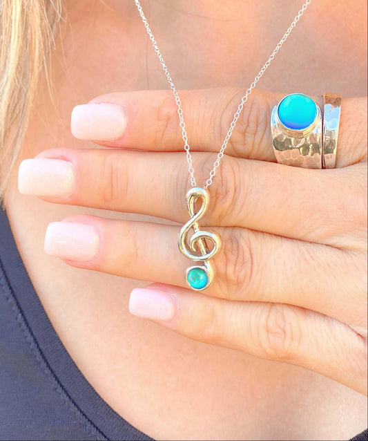 Musical Note Pendant and matching Musical Note Earrings. Each piece is crafted with high-quality sterling silver components, ensuring durability and style. Includes an 18" sterling silver 1mm cable chain with the pendant.