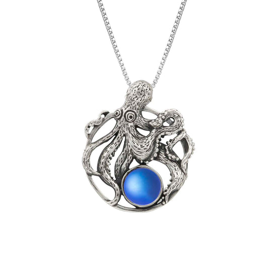 Octopus Pendant, this charming pendant holds a beautiful frosted blue gem. It comes with an 18" sterling silver .7mm box chain included, making it ready to wear.