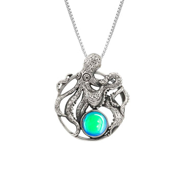Octopus Pendant, this charming pendant holds a beautiful polished green gem. It comes with an 18" sterling silver .7mm box chain included, making it ready to wear.