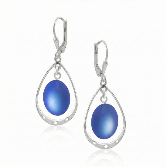 Oval with Loop Earrings featuring oval frosted blue crystals elegantly accented with sterling silver loops and come equipped with secure lever backs for a comfortable fit. 