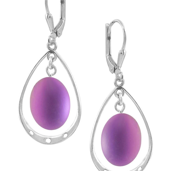 Oval with Loop Earrings featuring oval frosted pink crystals elegantly accented with sterling silver loops. The earrings come equipped with secure lever backs for a comfortable fit.
