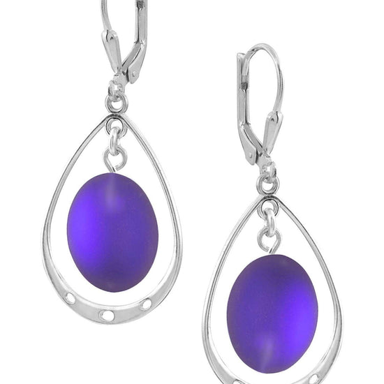 Oval with Loop Earrings featuring oval frosted violet crystals elegantly accented with sterling silver loops. The earrings come equipped with secure lever backs for a comfortable fit.