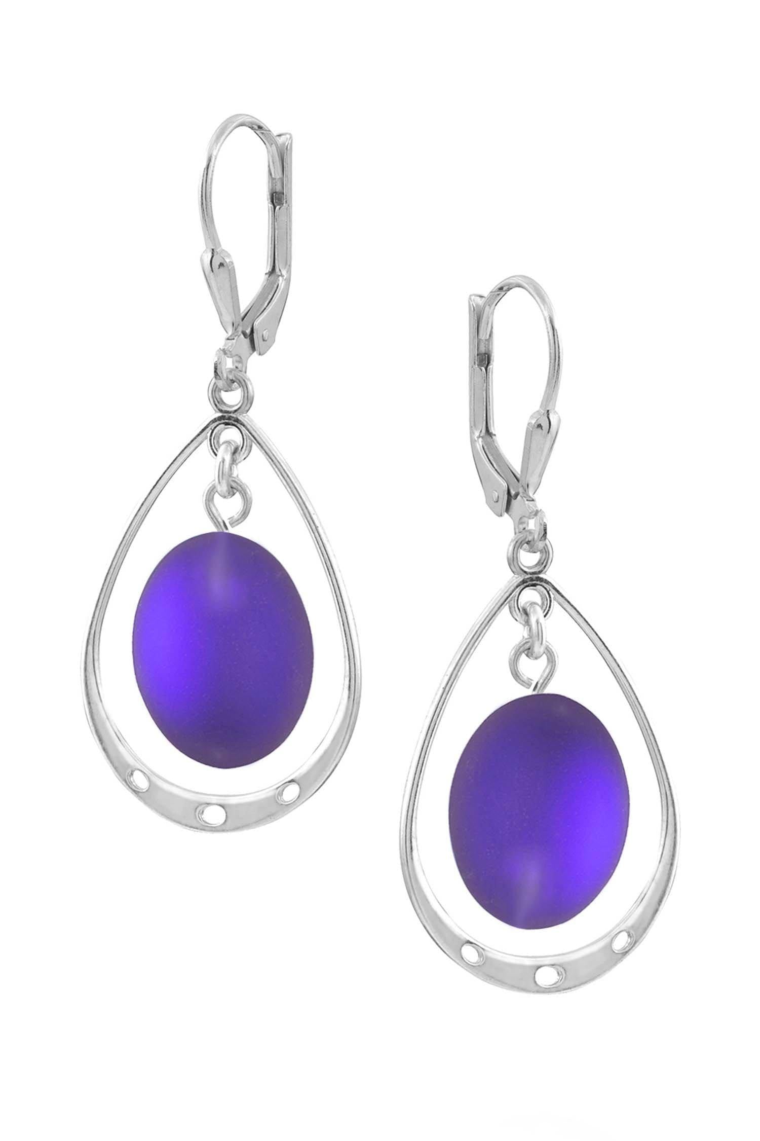 Oval with Loop Earrings featuring oval frosted violet crystals elegantly accented with sterling silver loops. The earrings come equipped with secure lever backs for a comfortable fit.