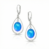 Oval with Loop Earrings featuring oval polished blue crystals elegantly accented with sterling silver loops and come equipped with secure lever backs for a comfortable fit. 