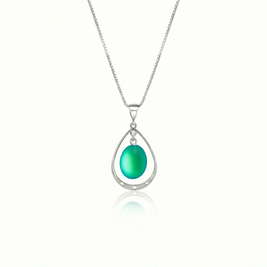 Oval with Loop Pendant handmade pendant pairs beautifully with any outfit, and you’ll love how the frosted green crystal oval shines with an iridescent glow of color from within. The pendant comes with an 18" sterling silver .7mm box chain included.