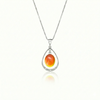 Oval with Loop Pendant handmade pendant pairs beautifully with any outfit, and you’ll love how the polished fire crystal oval shines with an iridescent glow of color from within. The pendant comes with an 18" sterling silver .7mm box chain included.