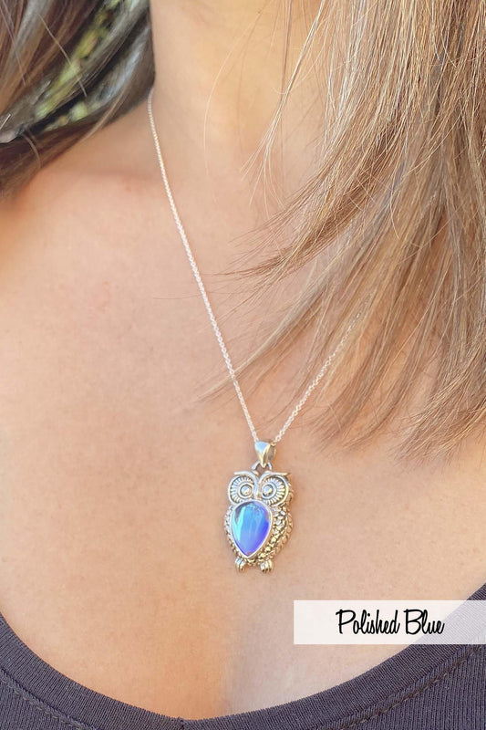 Owl Pendant features a stunning teardrop polished blue crystal front and center. The pendant comes with an 18" sterling silver .7mm box chain included.