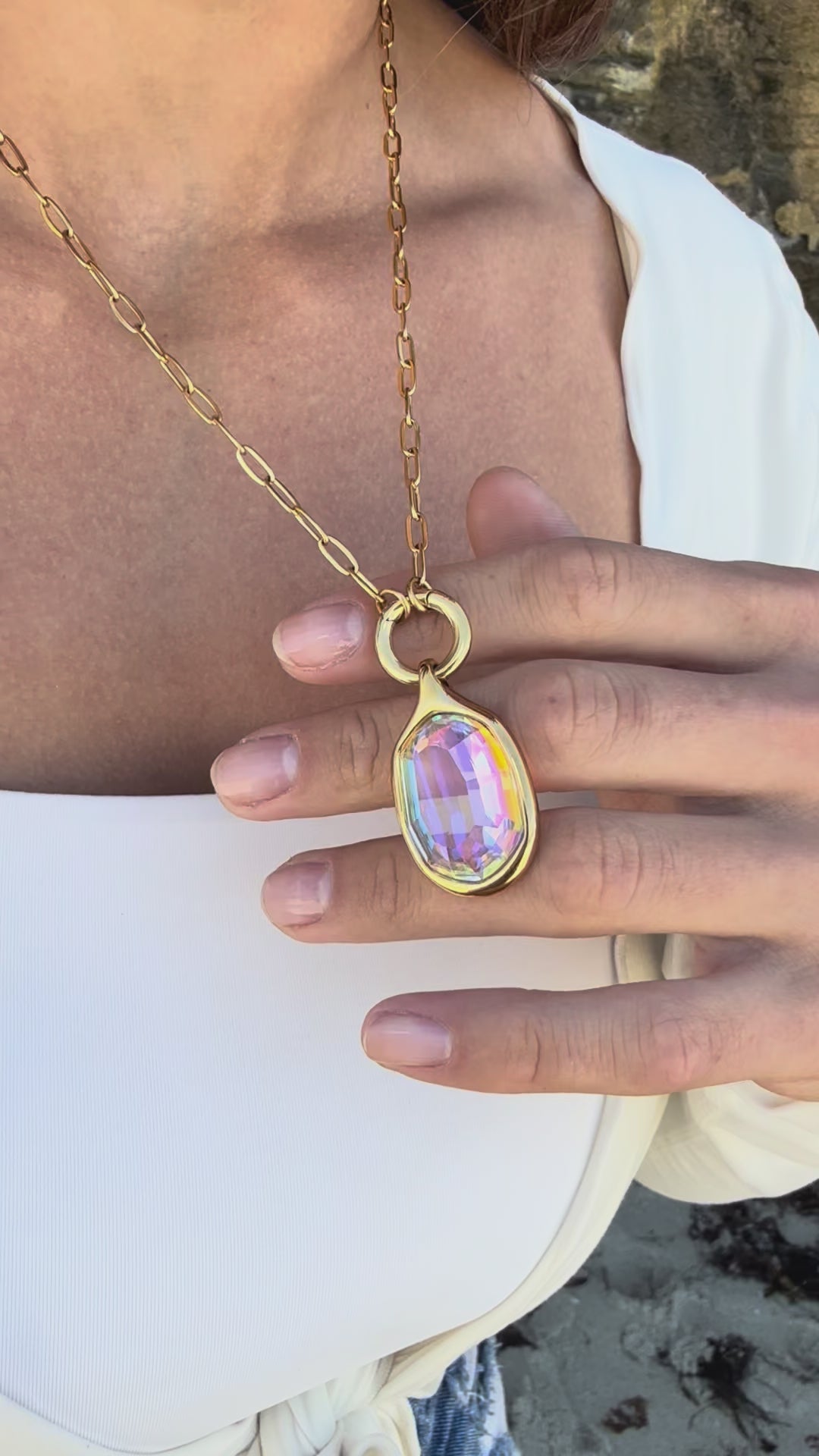 its balanced proportions and precision design make it perfect for layering or wearing alone, appealing to those who appreciate contemporary elegance and versatile styling.