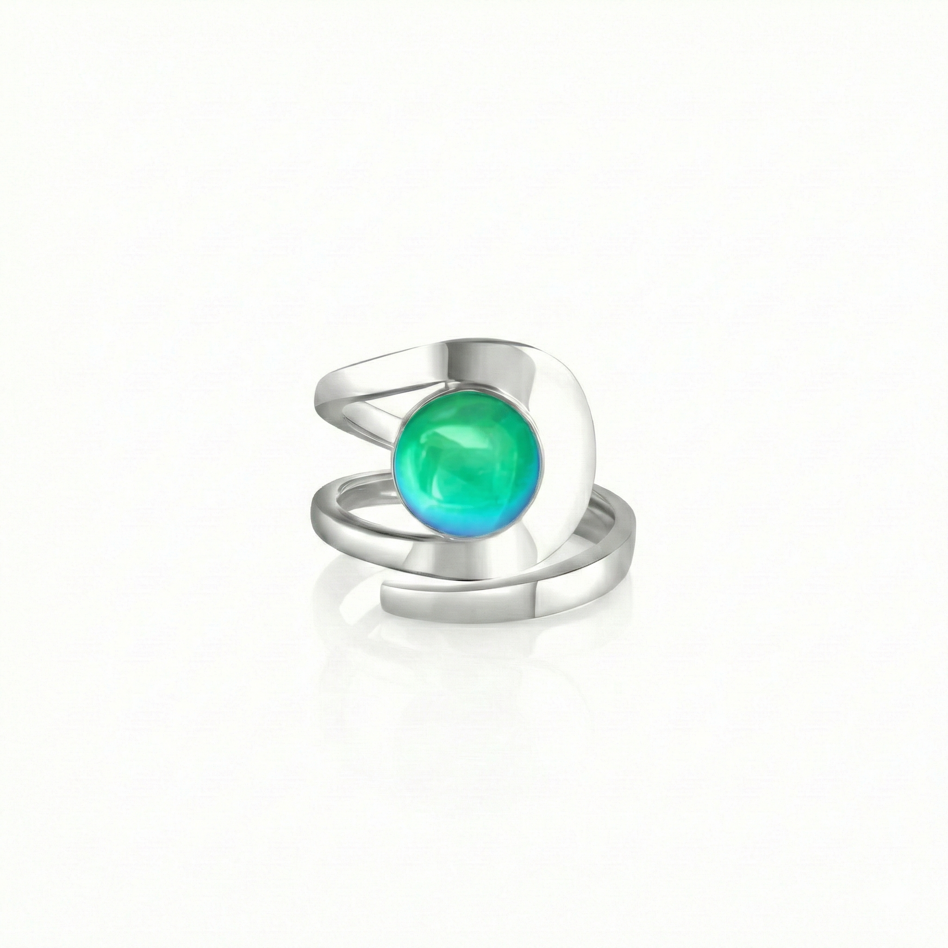 Raima Ring features a design that is not symmetrical, yet beautifully balanced. Its airy and light aesthetic brilliantly showcases the sparkling, polished green crystal at its center. Crafted from sturdy sterling silver, this ring is adjustable, allowing you to customize the fit starting at size 7.5.