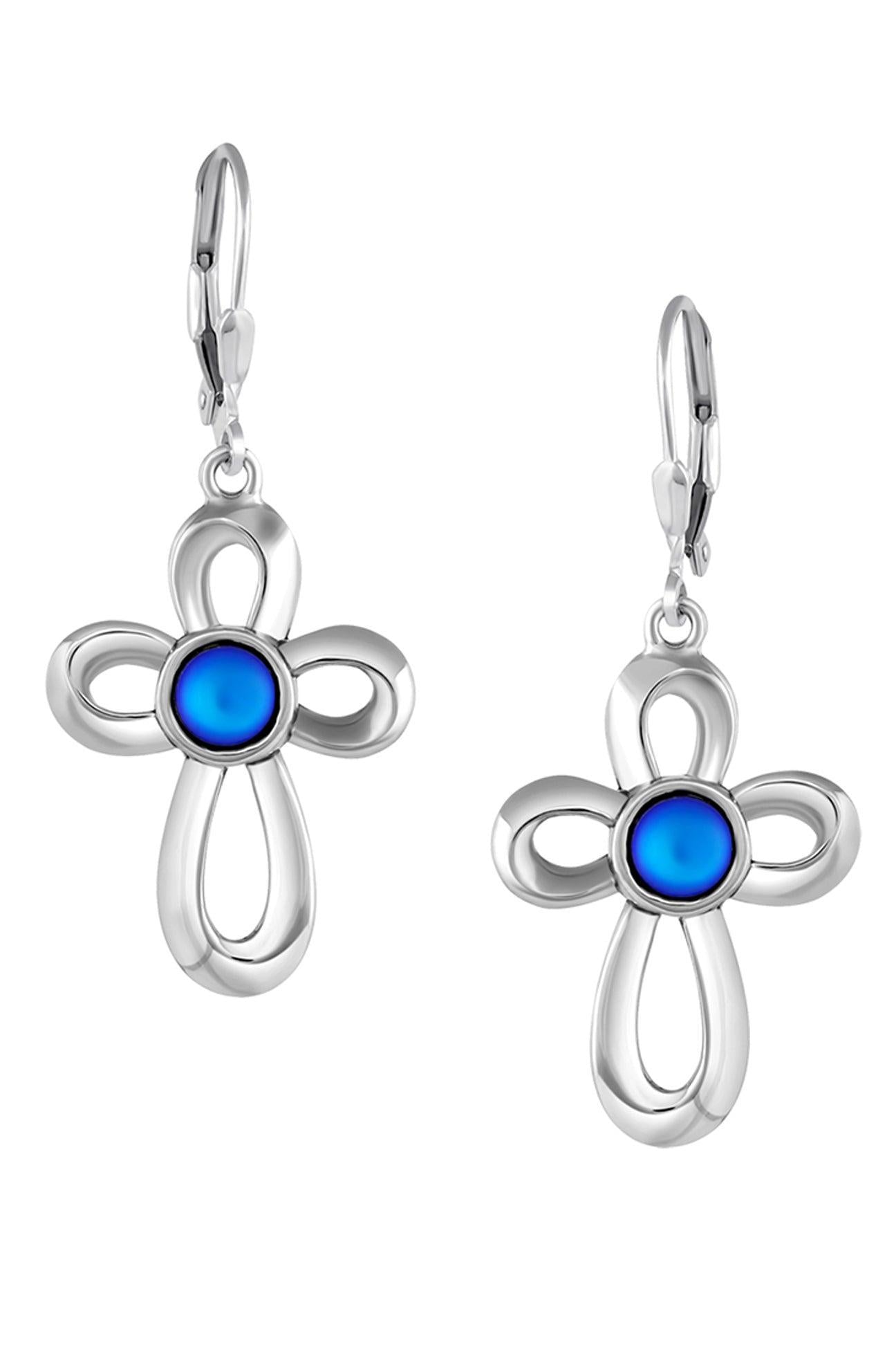 Ribbon Cross Earrings feature lever-back components that add a touch of elegance to the traditional cross design.  At the center, our signature color-changing frosted blue crystal beautifully enhances this classic religious symbol. These earrings are crafted from high-quality sterling silver, ensuring durability and shine. 