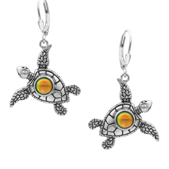 Sea Turtle Earrings, inspired by the Hawaiian Turtle, known as Honu. Crafted from sterling silver, these earrings with polished fire stone beautifully showcase your love for the ocean.