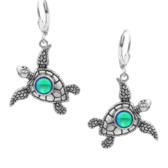 Sea Turtle Earrings, inspired by the Hawaiian Turtle, known as Honu. Crafted from sterling silver, these earrings with polished green stone beautifully showcase your love for the ocean.