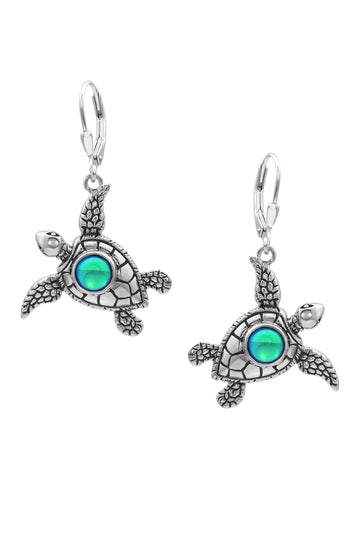 Sea Turtle Earrings, inspired by the Hawaiian Turtle, known as Honu. Crafted from sterling silver, these earrings with polished green stone beautifully showcase your love for the ocean.