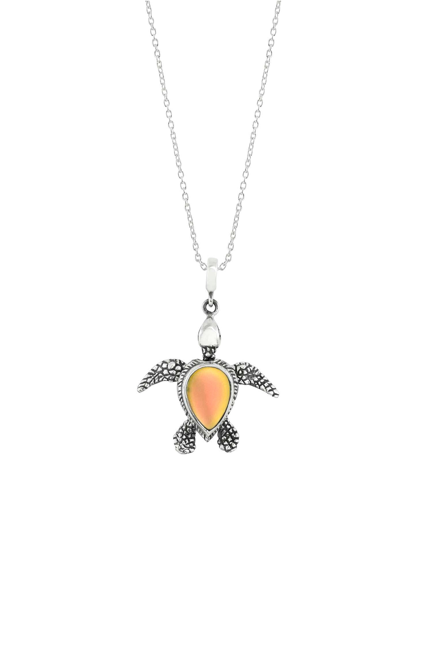 Sea Turtle Pendant, crafted from crystal and sterling silver. Inspired by the Hawaiian Green Turtle, known as Honu, this frosted fire pendant features moveable elements for the turtle's head, arms, legs, and tail. The pendant comes with an 18" sterling silver .7mm box chain included.