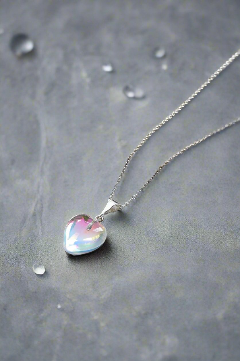 Small Crystal Heart Pendant crafted with sterling silver components, this pendant is designed for both quality and style. Includes a 16" sterling silver .7mm box chain with the polished pink pendant.
