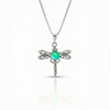 Small Dragonfly Pendant crafted from high-quality sterling silver, this pendant features a beautifully detailed dragonfly design. Adorned with a stunning 5mm polished green stone, this pendant adds a subtle pop of color and sparkle comes with an 18” sterling silver box chain.