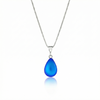 Crystal Small Drop Pendant Crafted with sterling silver components, this frosted blue pendant comes with an included 18" sterling silver .7mm box chain for a polished look.