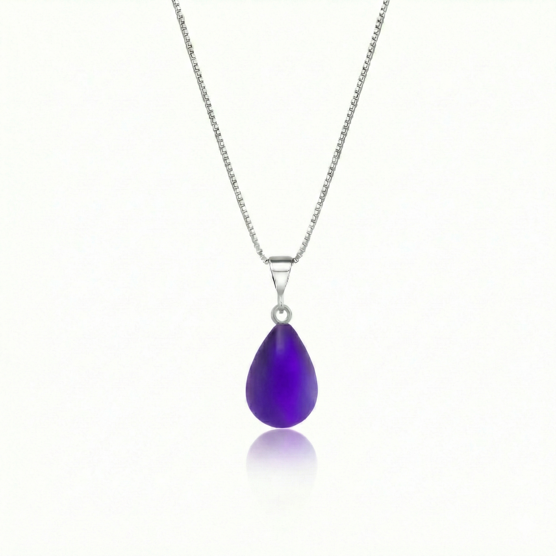 Crystal Small Drop Pendant Crafted with sterling silver components, this frosted violet pendant comes with an included 18" sterling silver .7mm box chain for a polished look.
