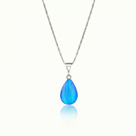 Crystal Small Drop Pendant Crafted with sterling silver components, this polished blue pendant comes with an included 18" sterling silver .7mm box chain for a polished look.