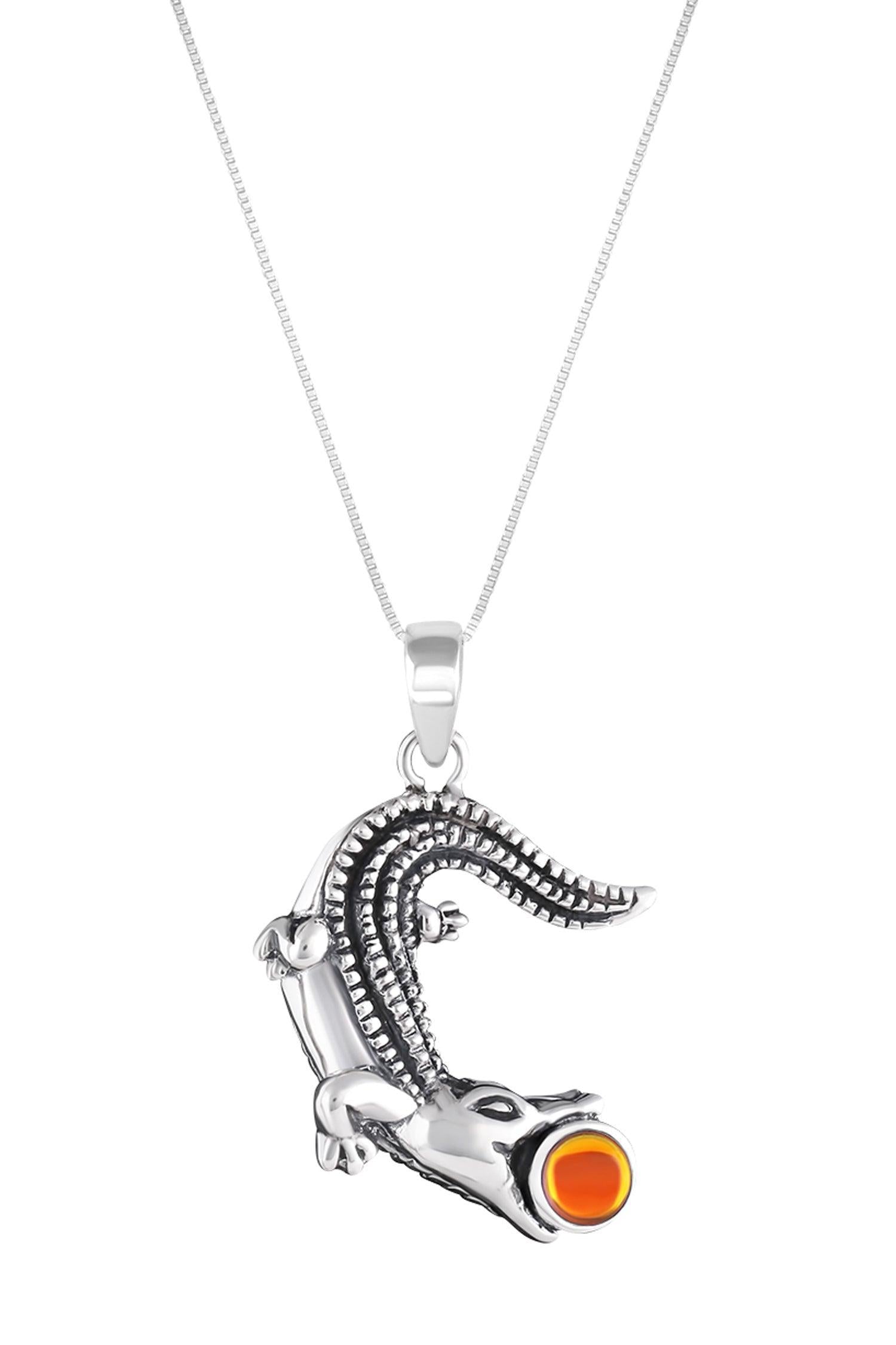Small Gator Pendant, custom-made for Gatorland in Florida, this pendant showcases a unique design that captures the spirit of the iconic alligator. Featuring a stunning 5mm polished fire stone set in solid .925 sterling silver.