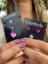 Small Heart Pendant featuring a sterling silver chain and matching Heart Stud Earrings. Made from durable sterling silver, the polished pink stone pendant with a 16" sterling silver box chain.