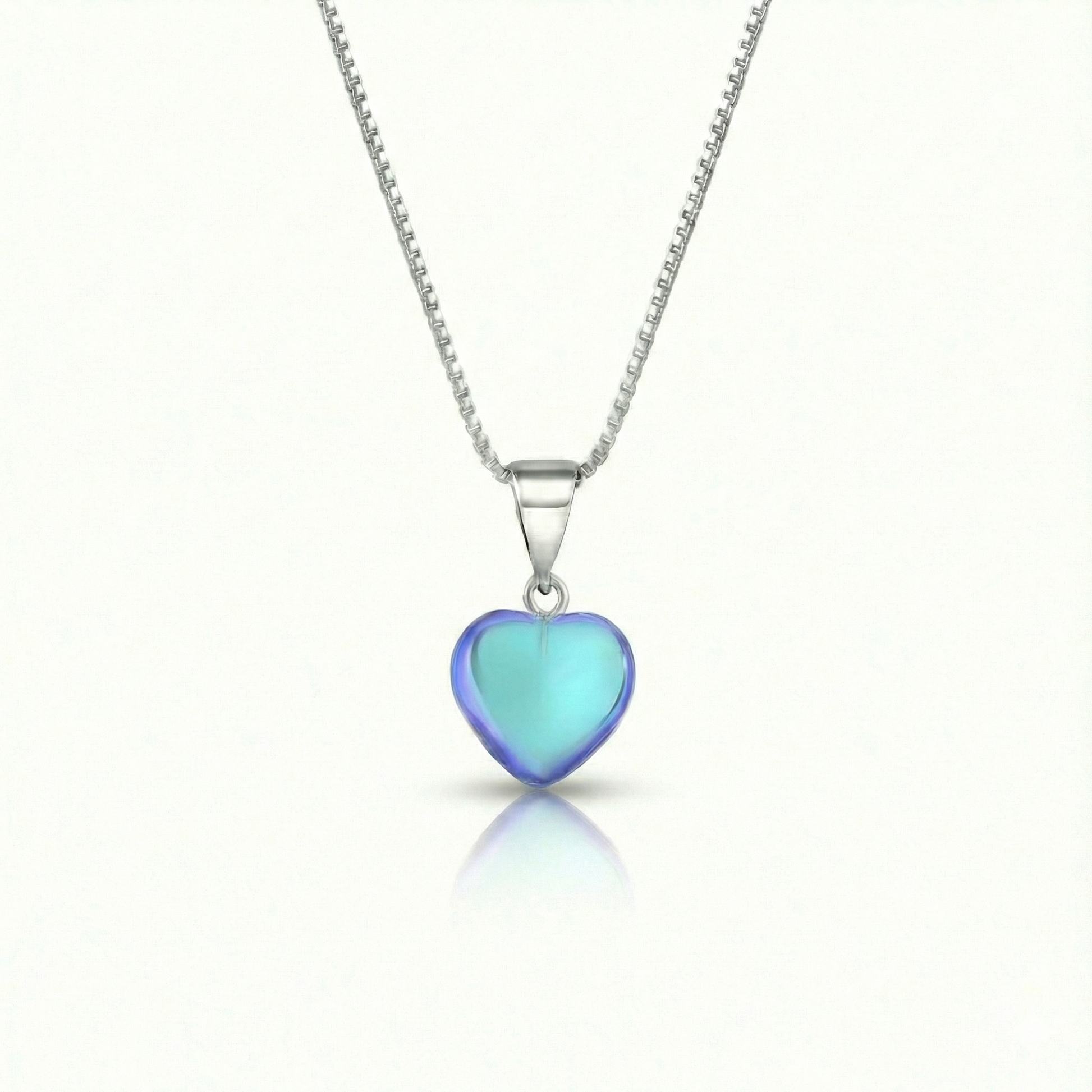 Small Crystal Heart Pendant crafted with sterling silver components, this pendant is designed for both quality and style. Includes a 16" sterling silver .7mm box chain with the polished aqua pendant.