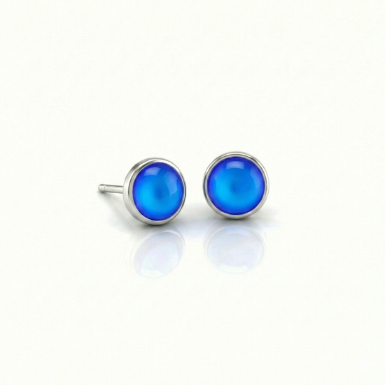 Small Stud Earrings with 5 mm frosted blue crystal. Designed with comfortable backs, these earrings ensure a secure fit.