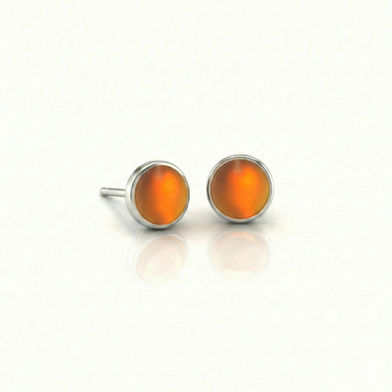 Small Stud Earrings with 5 mm frosted fire crystal. Designed with comfortable backs, these earrings ensure a secure fit.