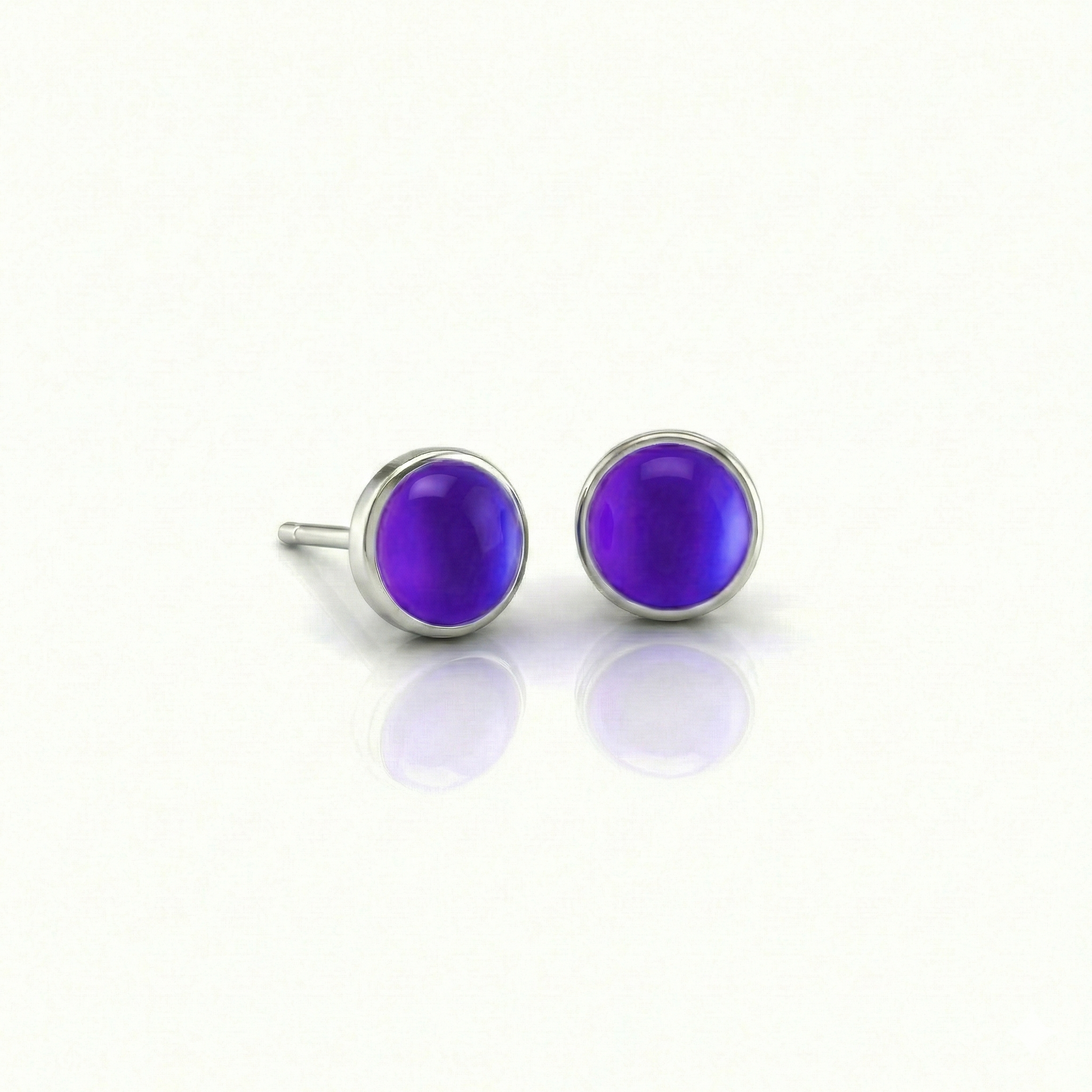 Small Stud Earrings with 5 mm frosted violet crystal. Designed with comfortable backs, these earrings ensure a secure fit.