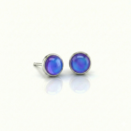 Small Stud Earrings with 5 mm polished violet crystal. Designed with comfortable backs, these earrings ensure a secure fit.