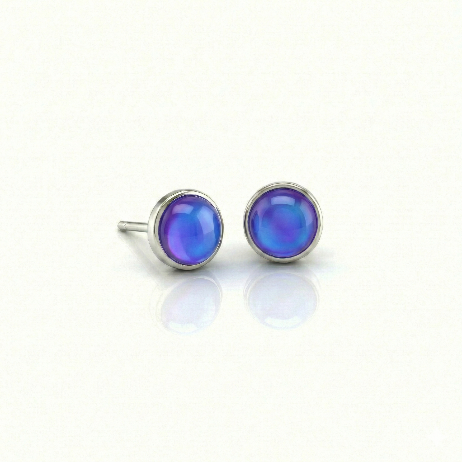 Small Stud Earrings with 5 mm polished violet crystal. Designed with comfortable backs, these earrings ensure a secure fit.