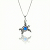 Small Turtle Pendant featuring a charming design, this pendant is adorned with a 5mm frosted blue stone that adds a touch of sparkle. It comes with an 18" .7mm sterling silver box chain, ensuring it’s ready to wear right away.