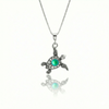 Small Turtle Pendant featuring a charming design, this pendant is adorned with a 5mm frosted green stone that adds a touch of sparkle. It comes with an 18" .7mm sterling silver box chain, ensuring it’s ready to wear right away.