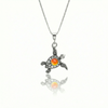 Small Turtle Pendant featuring a charming design, this pendant is adorned with a 5mm polished fire stone that adds a touch of sparkle. It comes with an 18" .7mm sterling silver box chain, ensuring it’s ready to wear right away.