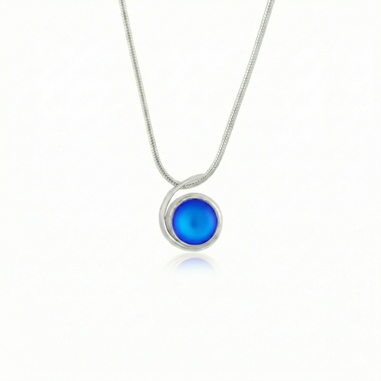 Small Wave Pendant, where it represents the "O" of Ocean Beach, while the surrounding silver symbolizes the "B." The pendant comes with a 1mm sterling silver snake chain, 18" long, with a frosted blue stone.