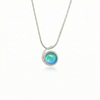 Small Wave Pendant, where it represents the "O" of Ocean Beach, while the surrounding silver symbolizes the "B." The pendant comes with a 1mm sterling silver snake chain, 18" long, with a polished aqua stone.