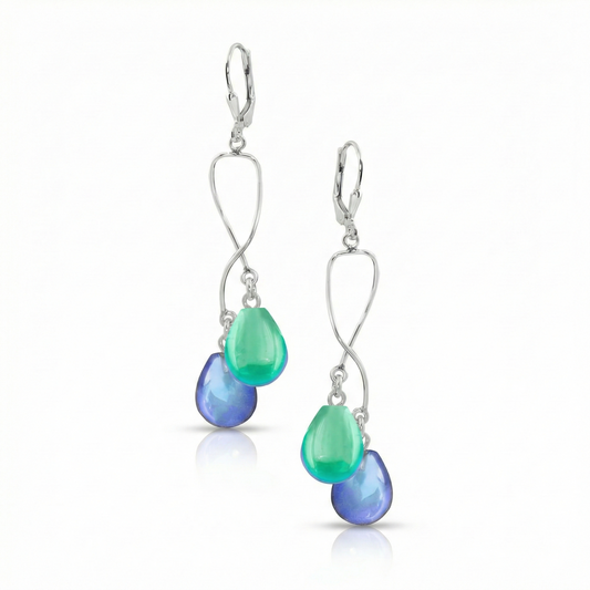 Beautiful Silver Spiral Earrings feature mesmerizing colors that captivate the eye, ensuring you’ll be hypnotized by their graceful movement. With secure lever backs, you can wear them comfortably all day long.