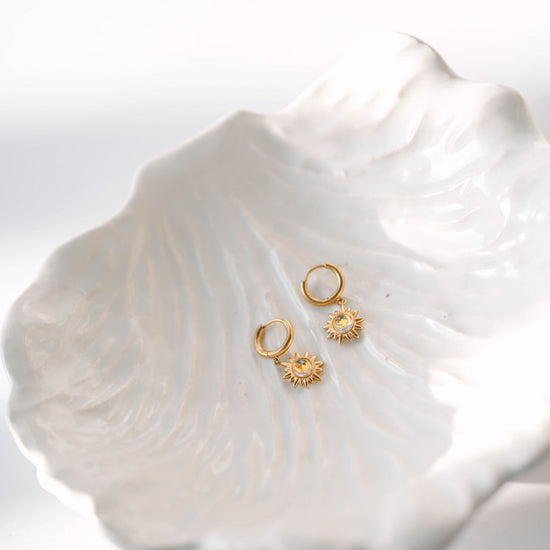 Star Earrings Celestial-inspired star earrings that capture the timeless allure of the night sky. These pieces feature carefully crafted star designs that evoke wonder and cosmic elegance. 