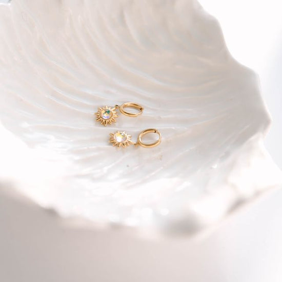 Star Earrings Celestial-inspired star earrings that capture the timeless allure of the night sky. These pieces feature carefully crafted star designs that evoke wonder and cosmic elegance. 