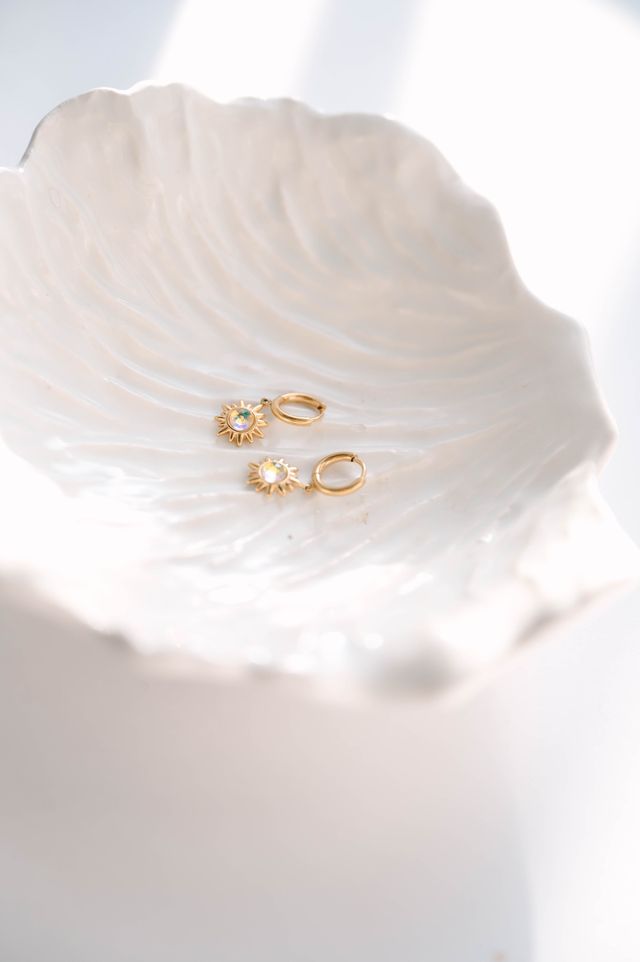 Star Earrings Celestial-inspired star earrings that capture the timeless allure of the night sky. These pieces feature carefully crafted star designs that evoke wonder and cosmic elegance. 