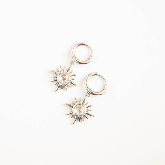 Star Earrings Celestial-inspired star earrings that capture the timeless allure of the night sky. These pieces feature carefully crafted star designs that evoke wonder and cosmic elegance.