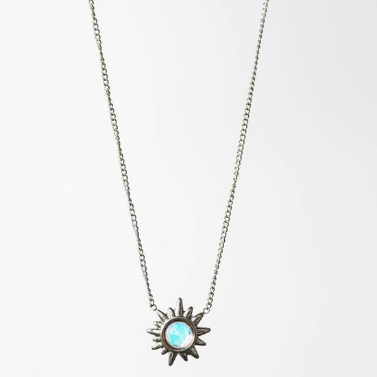 striking star pendant, expertly crafted to make a sophisticated statement. The design captures celestial elegance with clean lines and refined proportions, making it versatile enough for everyday wear or special occasions.