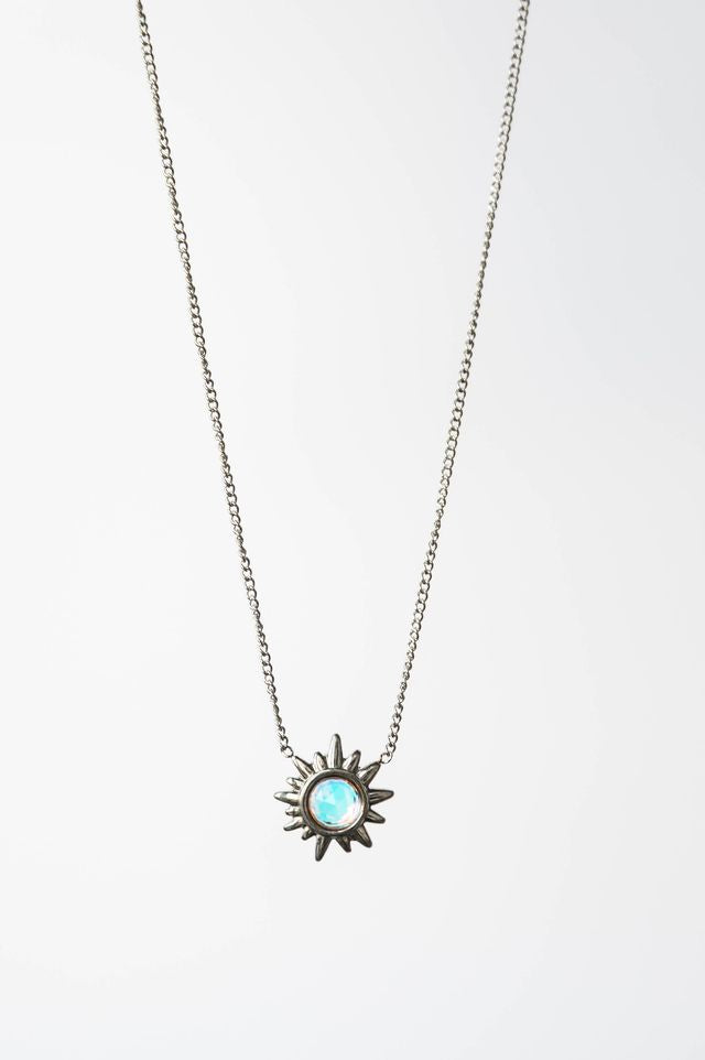 striking star pendant, expertly crafted to make a sophisticated statement. The design captures celestial elegance with clean lines and refined proportions, making it versatile enough for everyday wear or special occasions.