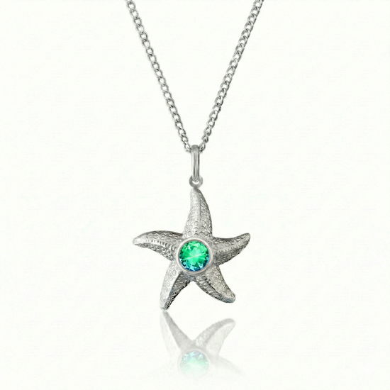 Starfish Necklace featuring a 16"-18" adjustable silver stainless chain with  5mm round green stone.