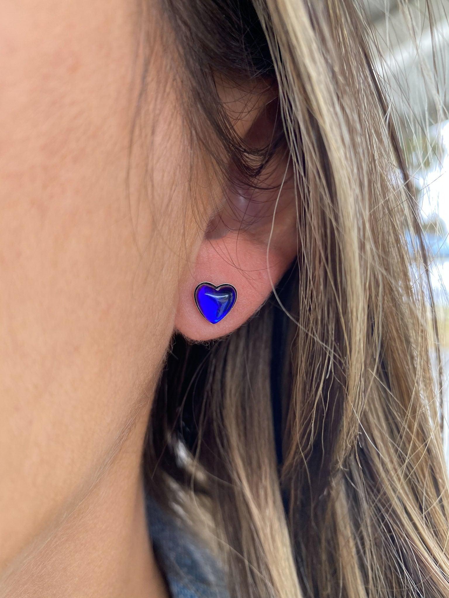 Stud Heart Earrings featuring a stunning 7mm polished violet stone set in .925 sterling silver posts.