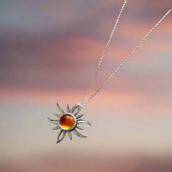 Sun Pendant crafted with high-quality sterling silver components, the polished fire pendant comes complete with an 18" sterling silver .7mm box chain.