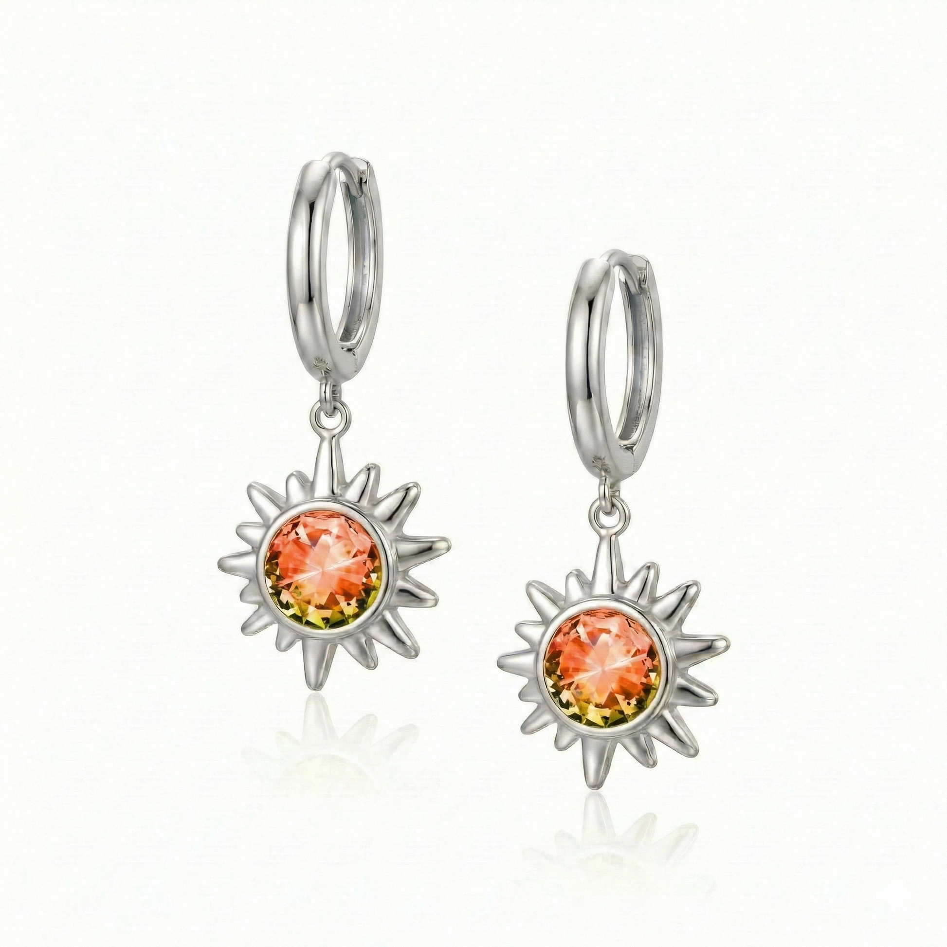 Sunburst Crystal Earrings features silver stainless 11mm hoop diameter with 5mm round fire stone.