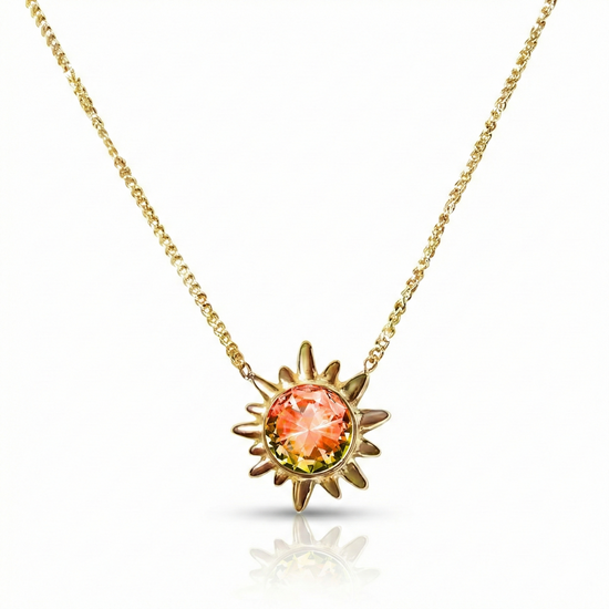 Sunburst Crystal Necklace features a 16"-18" 18K gold stainless steel adjustable chain with 5mm fire stone.